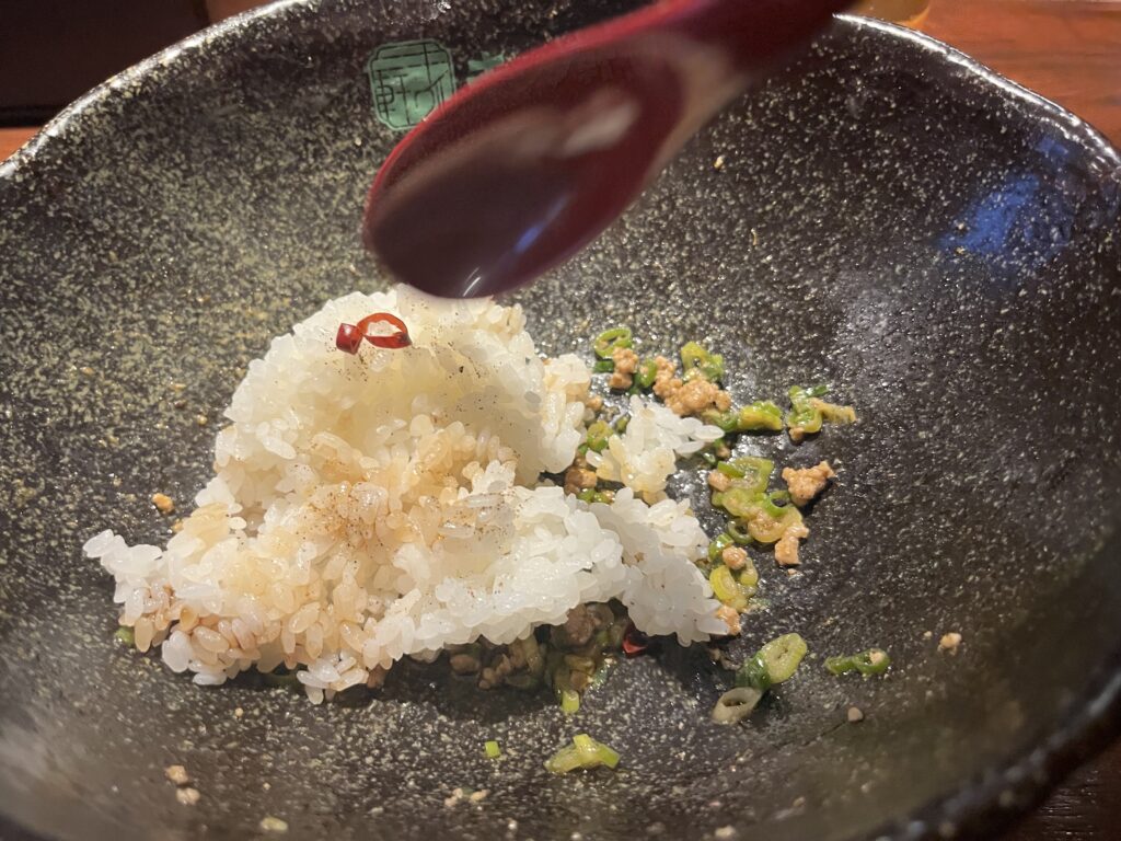 広島 キング軒の汁なし担々麺 〆の半ライスの写真